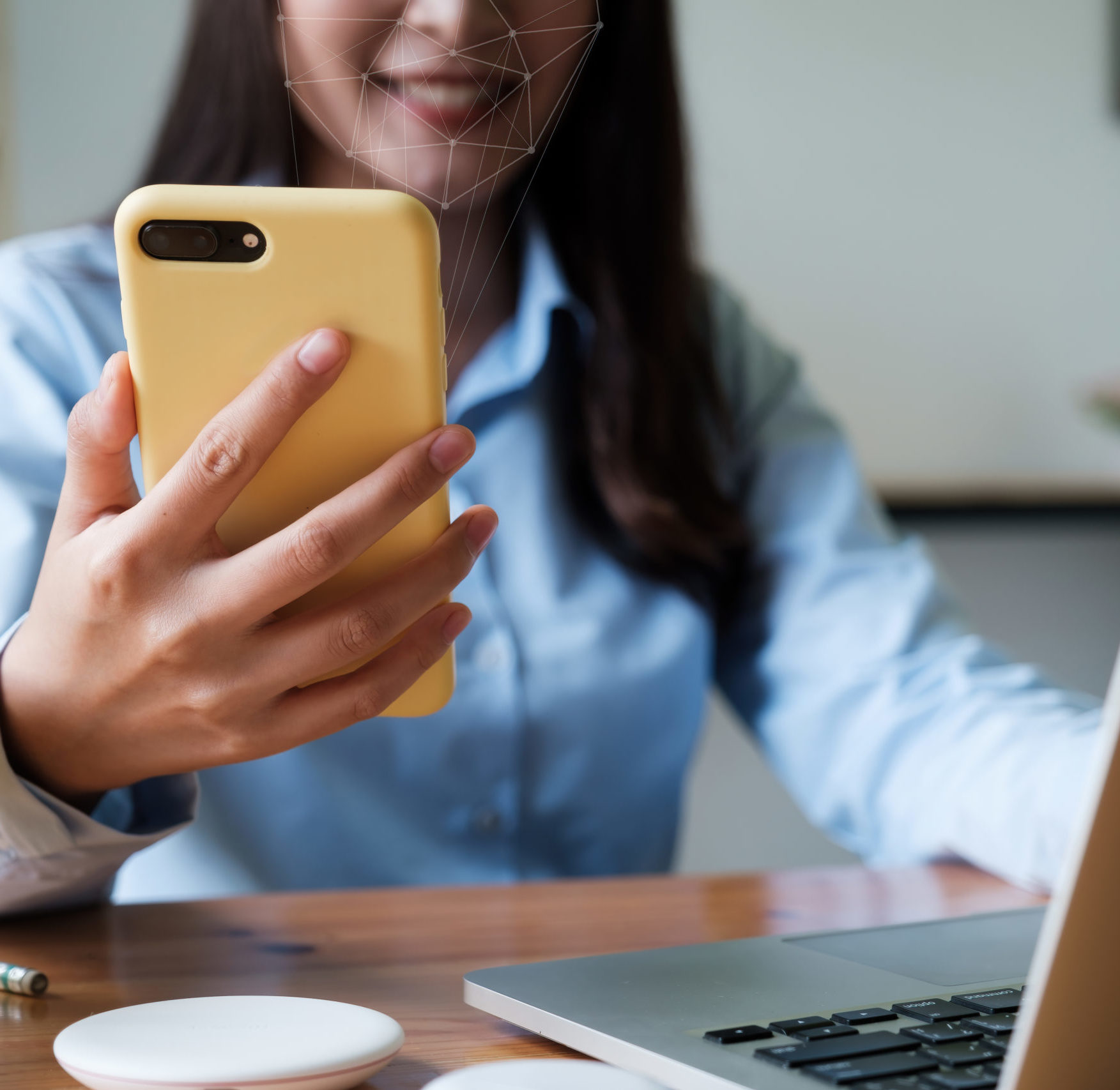 A businesswoman completes KYC using an online banking program in order to open a digital savings account. The definition of cyber security.
